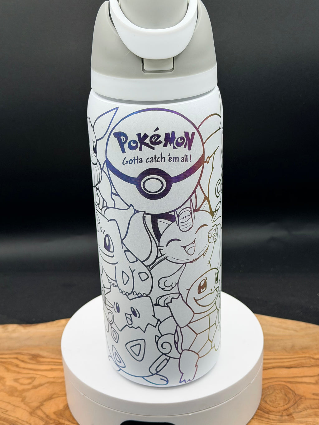 “Gotta catch 'em all" 32 oz Laser Engraved Water Bottle