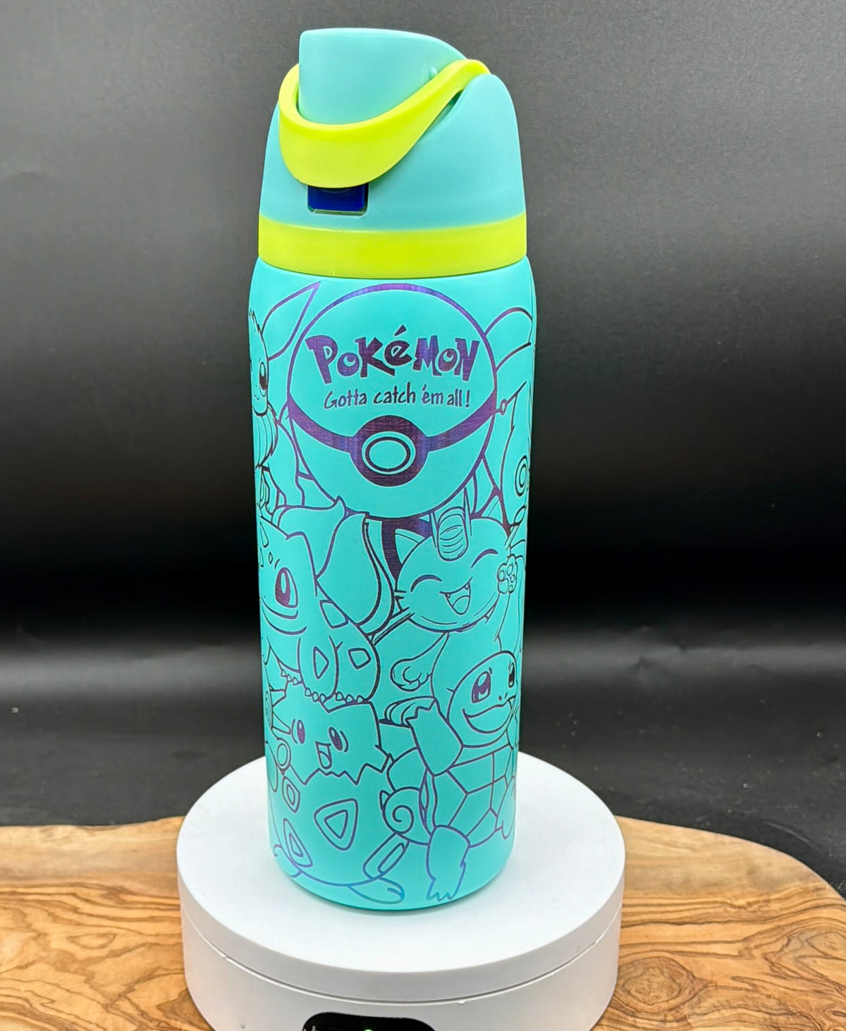 “Gotta catch 'em all" 32 oz Laser Engraved Water Bottle
