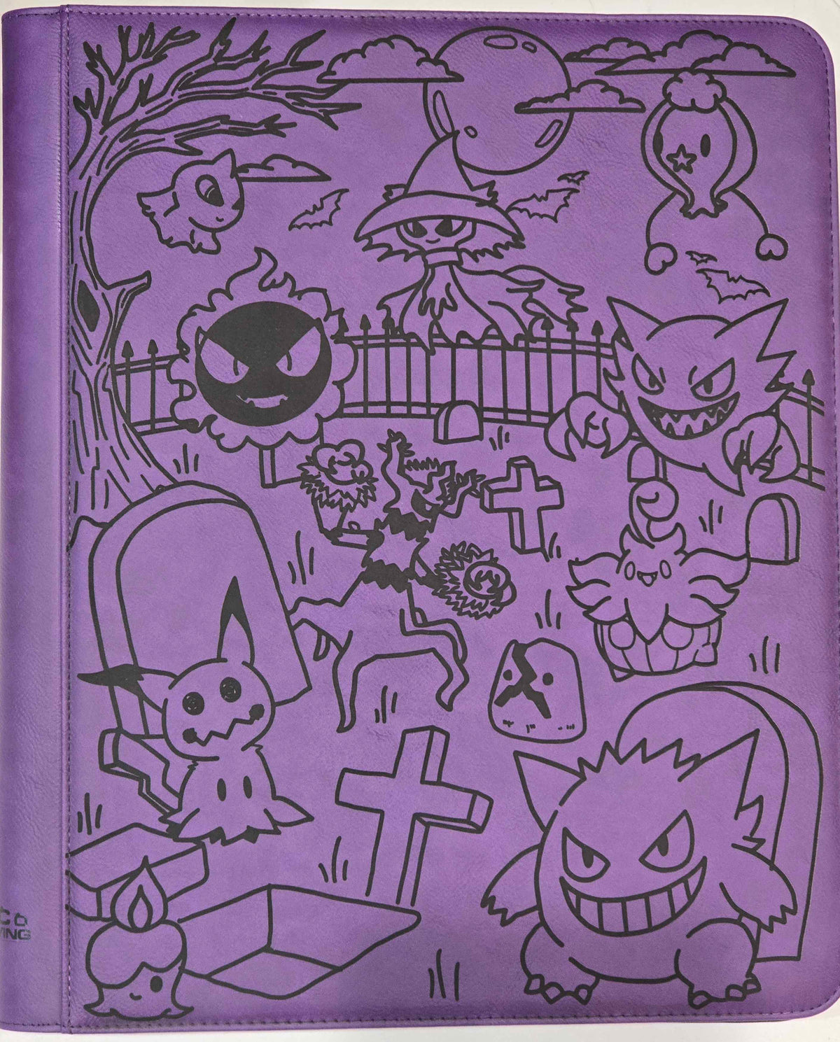 Purple TCG binder with a laser-engraved Ghost Graveyard scene featuring ghost characters.